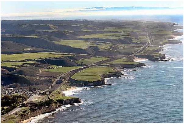 Looking down the coast from Davenport, at lower left, the Cotoni-Coast Dairies National Monument comprises most of the visible land from Highway 1 leading into the hills. (Flight courtesy of LightHawk). (Dan Coyro — Santa Cruz Sentinel)