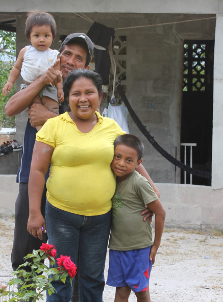 Happy farming family smiling in Penonome, Panama