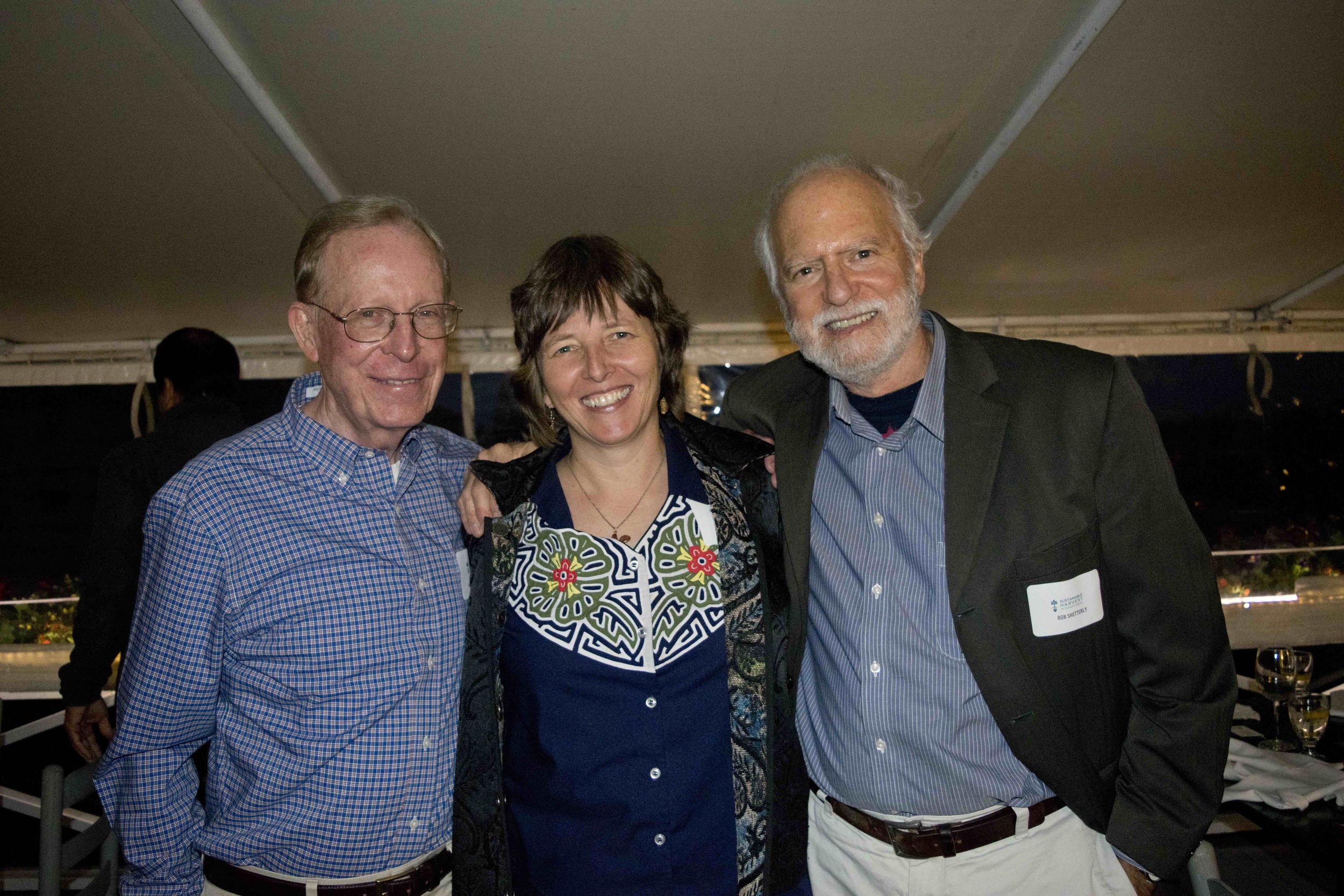 Steve Richards (Sustainable Harvest International Board Chair), Florence Reed (Sustainable Harvest International Founder + President), and Robert Shetterly (artist and activist)