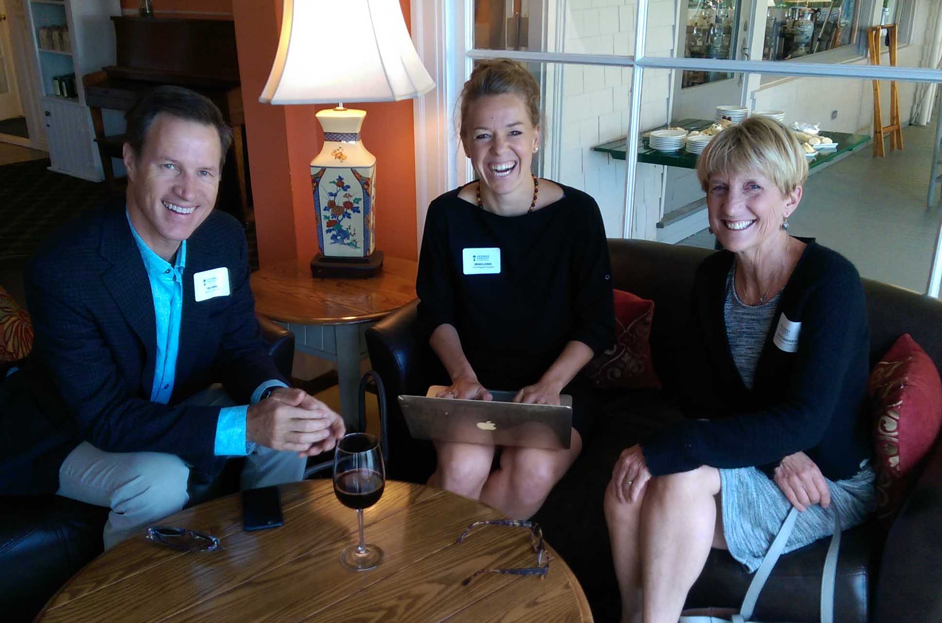 Tom Thomas (Board Member), Amanda Zehner (Field Program Director), and Charlotte Dougherty (Vice Chair of the Board of Directors) get one last meeting in before dinner starts!