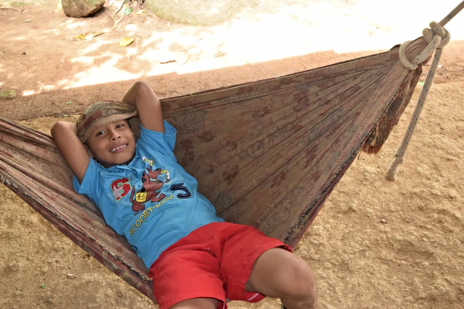 Urita's grandson Jonathan relaxing on a hammock