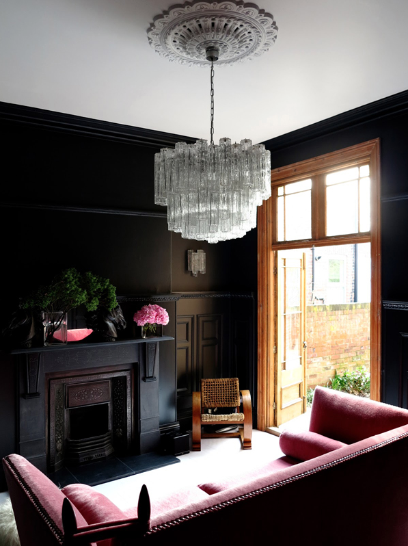 black_interior_walls_with_70's_chandelier.png