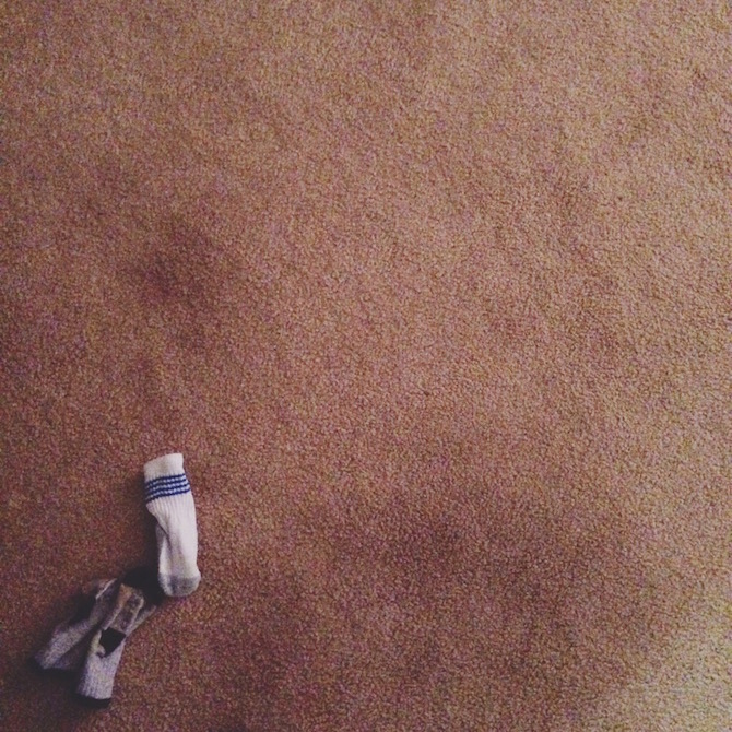 Tiny little socks, everywhere. Because for whatever reason, they just won't stay on his feet. 