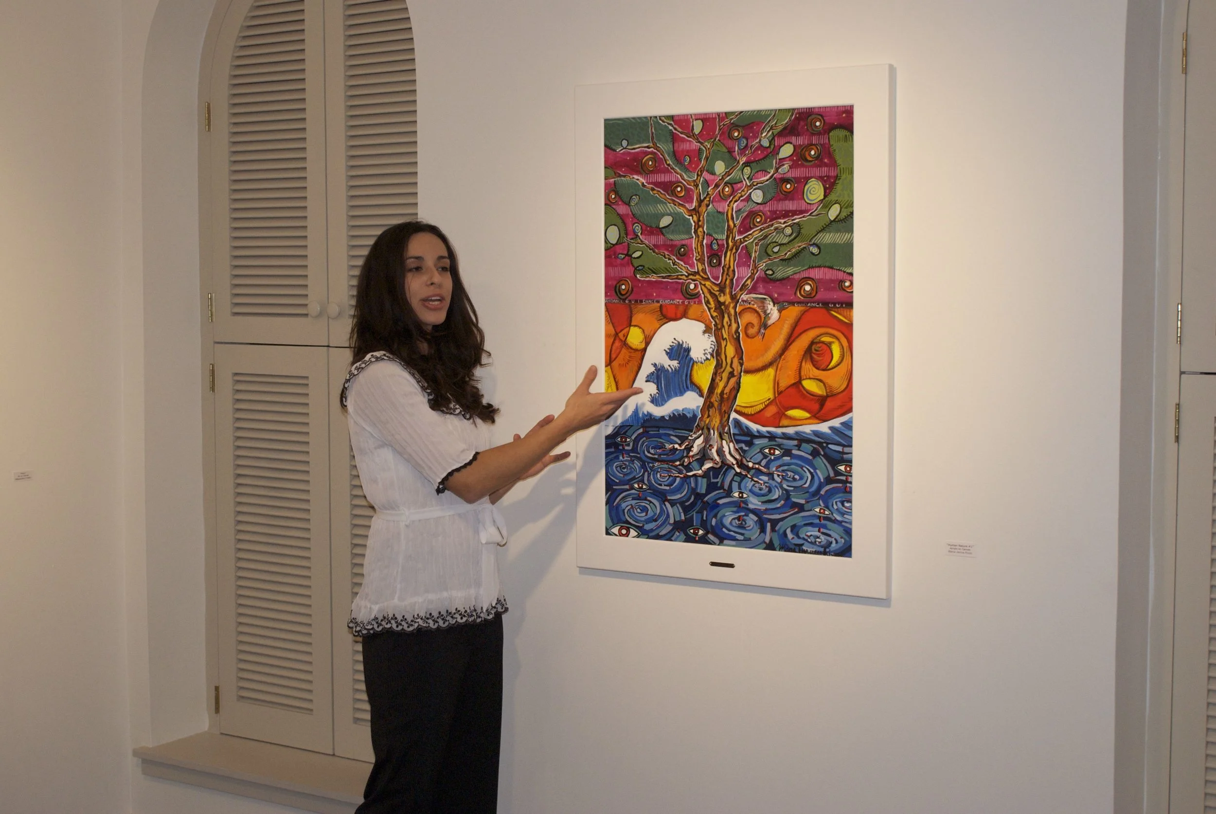 Maria Rizzo gives an artist talk for her first group art show at The RedHouse Arts Center in 2010.