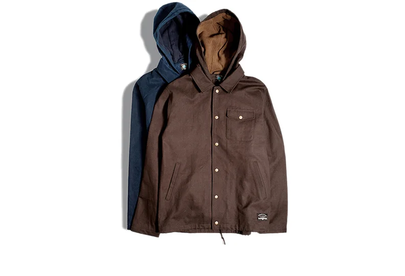  FOURSTAR® CANVAS COACH - Hooded coach's jacket with shirt collar,&nbsp;chest pocket and antique metal snaps. Cotton canvas shell&nbsp;and polar fleece lining. (shown in Navy and Cocoa) 