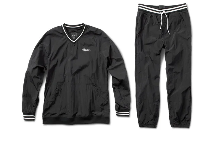  PRIMITIVE® CREPED WARM-UP SET - Lightweight creped poly pullover and warm-up pant set. Striped rib and logo embroideries. (Shown in Black) 