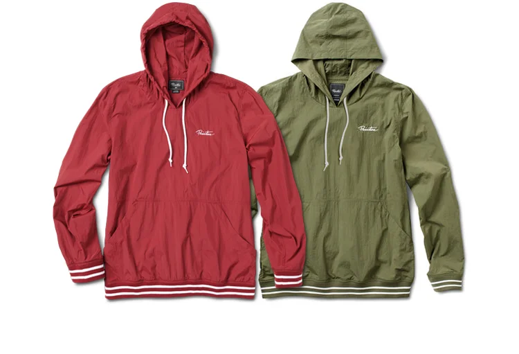  PRIMITIVE® CREPED HOOD -&nbsp;Lightweight creped poly woven pullover hood. Yarn-dye striped rib at cuffs and waistband. Logo embroidery at chest. (Shown in Brick and Olive) 