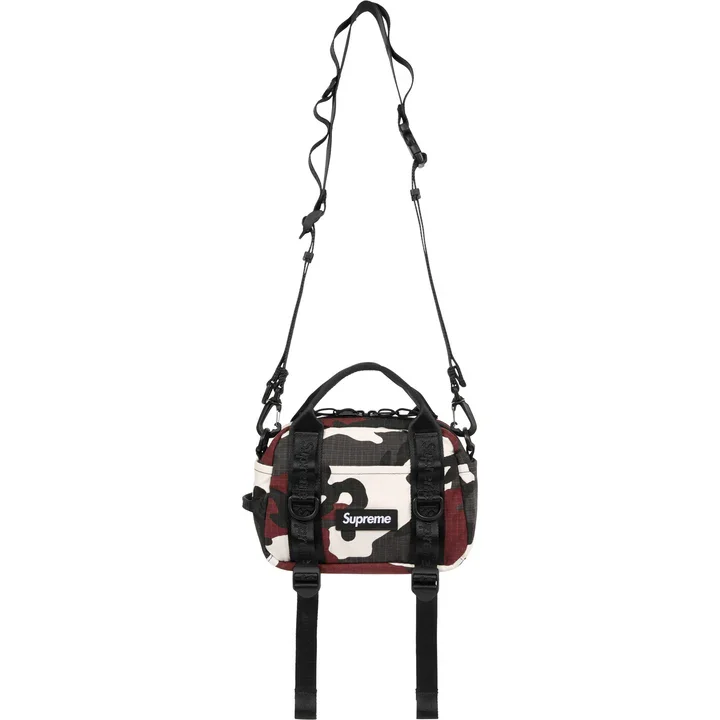 B6_SS26_MiniBostonBag_RedCamo01_720x.webp