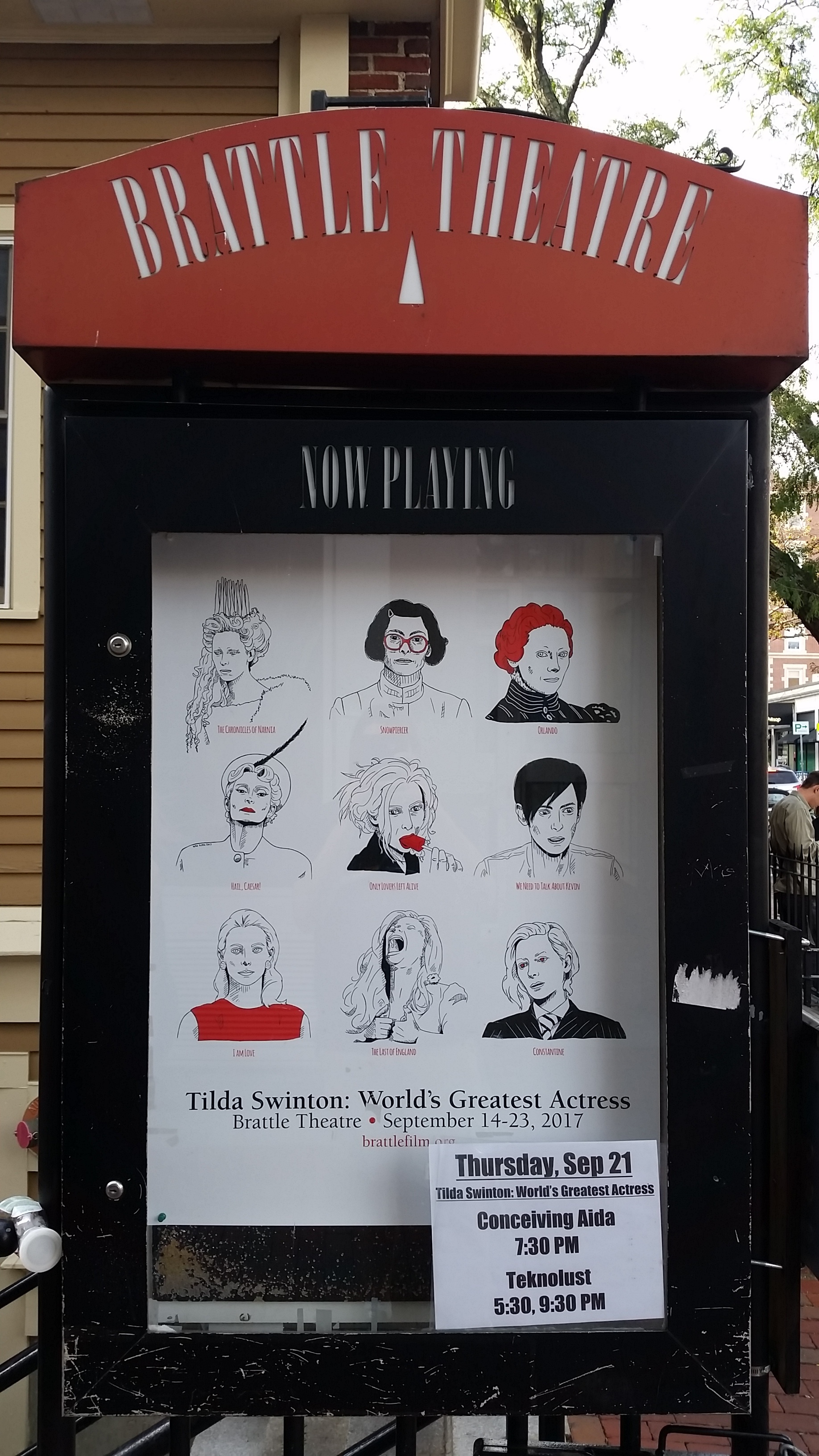 Outdoor sign showcasing the Tilda Swinton retrospective.