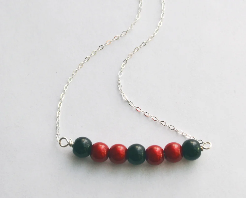 RedSkullBeaded Neck.jpg