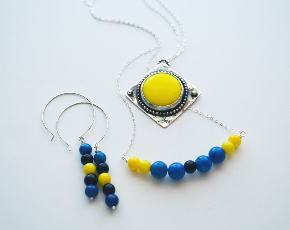 pair of sterling silver 5 beaded droplet hoop earrings, nine small beads on sterling silver chain, medium circular glass on silver square setting on sterling silver chain