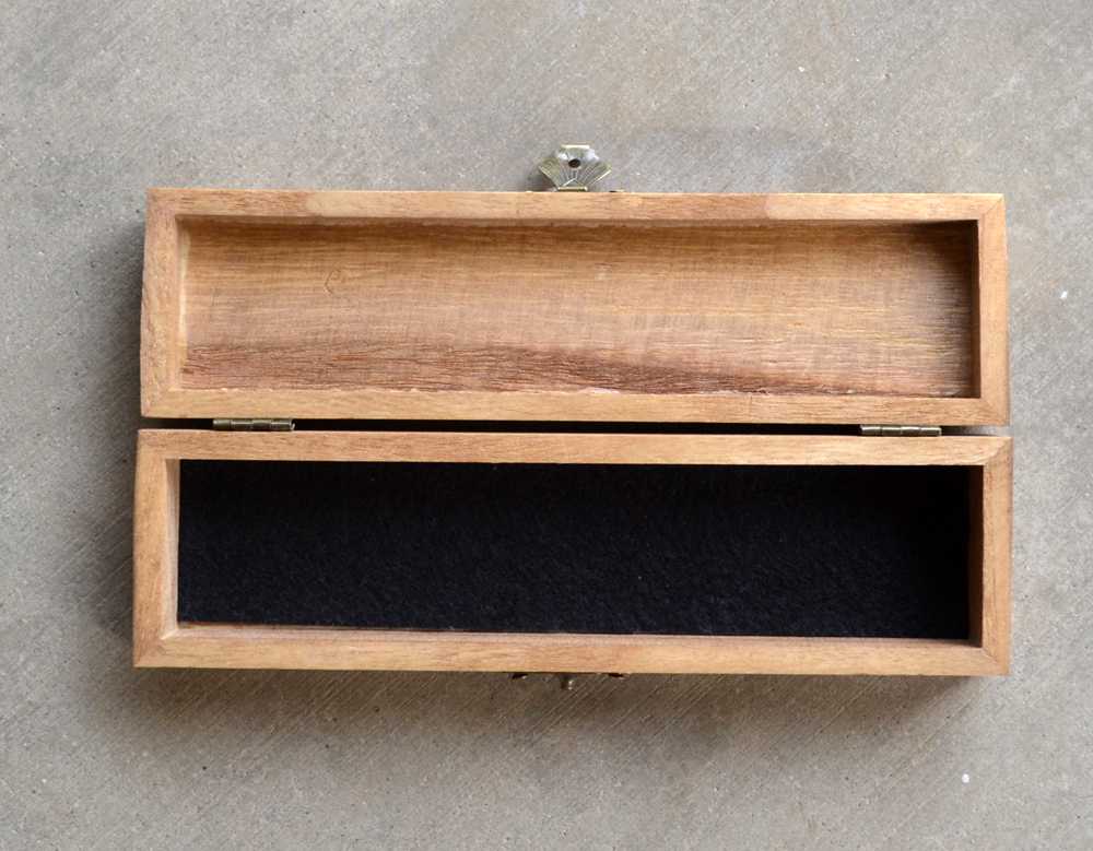 aerial view open dice tray midnight black felt