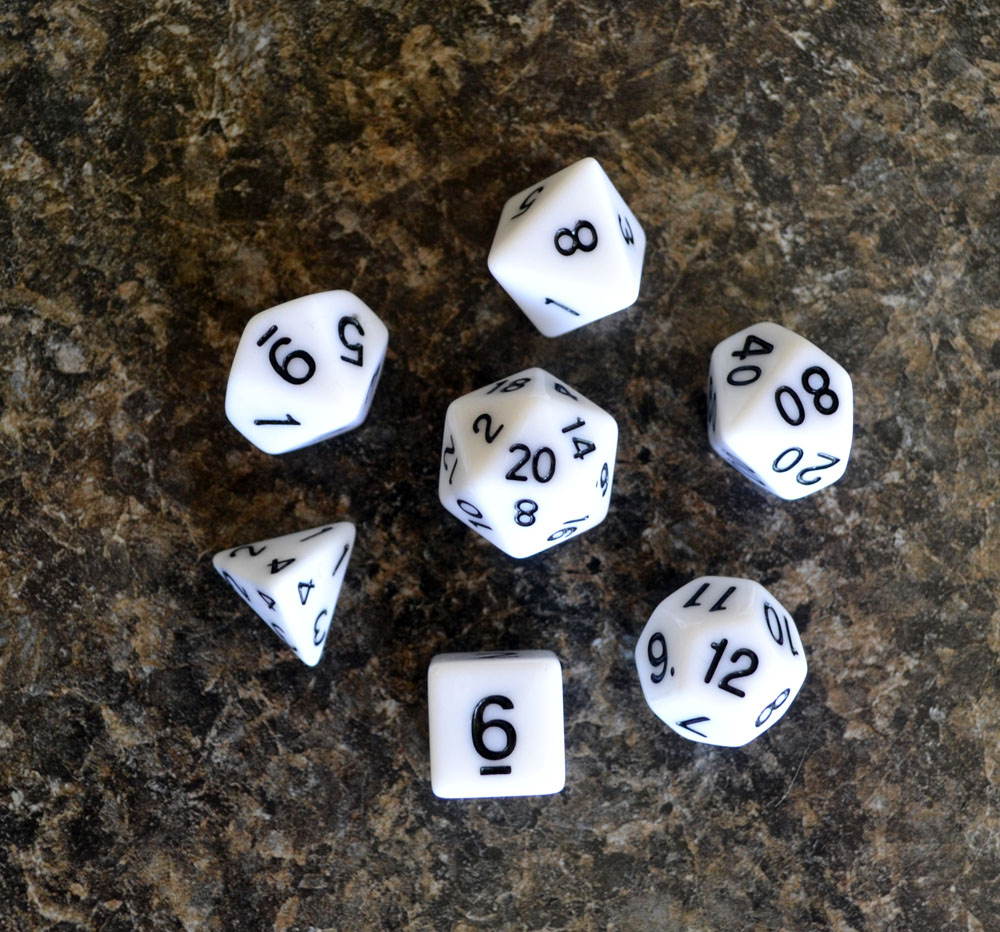 close up of polyhedral set circling a d20