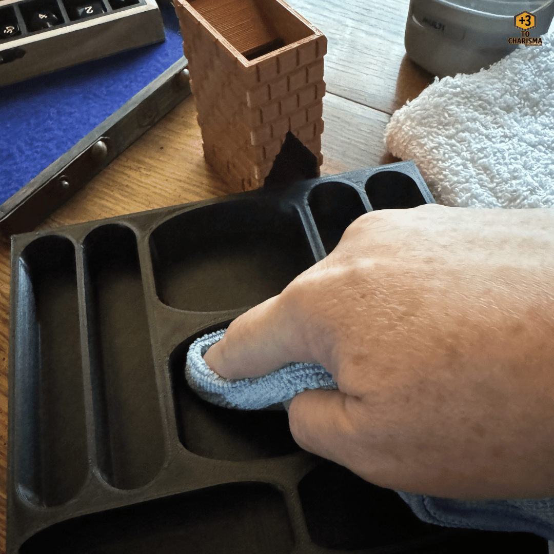 Cleaning a 3d printed tray with a soft cloth and water