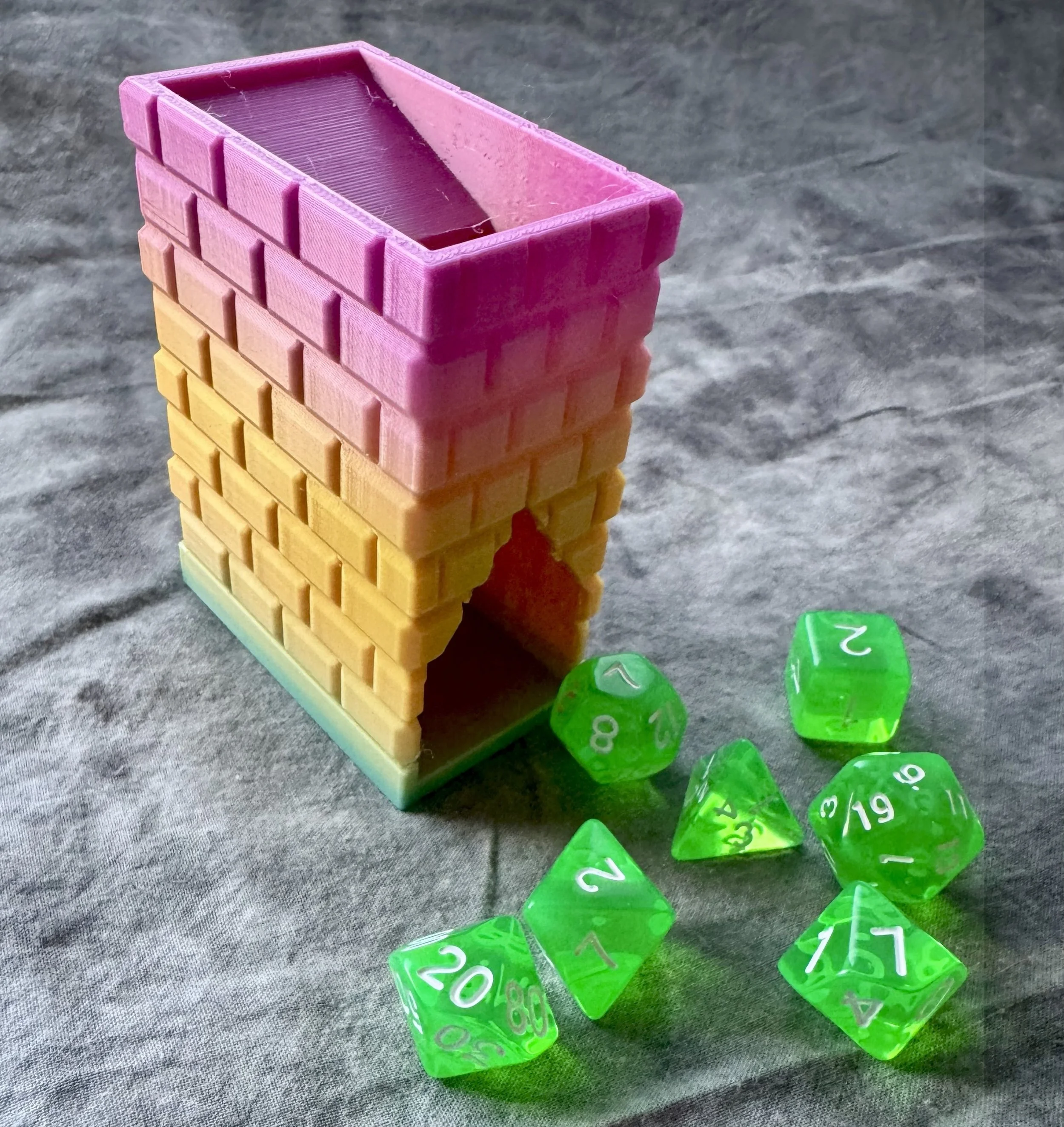 Rainbow gradient 3d printed travel tower w_green dice.jpg (Copy)
