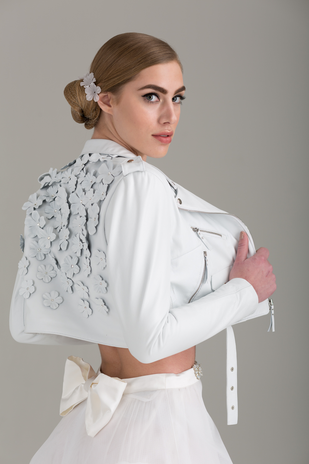    NKB17-84001    Nathalie Cropped Lambskin Leather MC Jacket Embellished w/ Hand-Made Leather Flowers &amp; Swarovski Crystals;  NKB17-81002  Apoidea Satin and Mesh Crop Top &amp;  NKB17-83005  Christina White Tulle Mesh A-line Skirt  