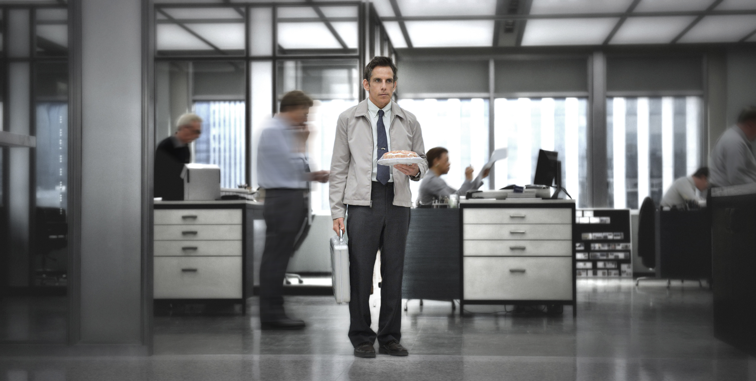 Ben Stiller as Walter Mitty, standing as the world rotates around him in The Secret Life of Walter Mitty (2013)