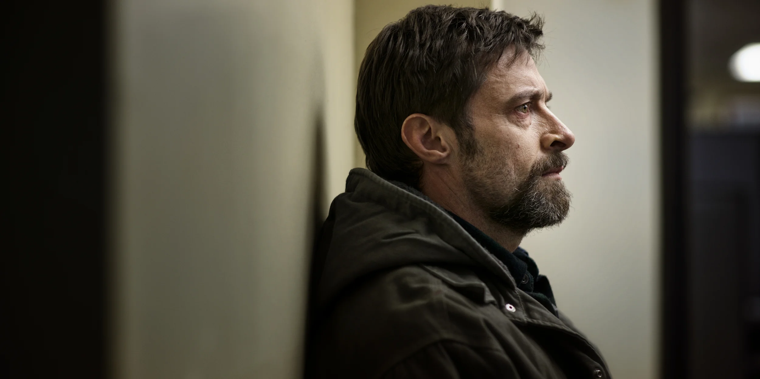 Hugh Jackman as Keller Dover as he waits at the police station in Prisoners (2013)
