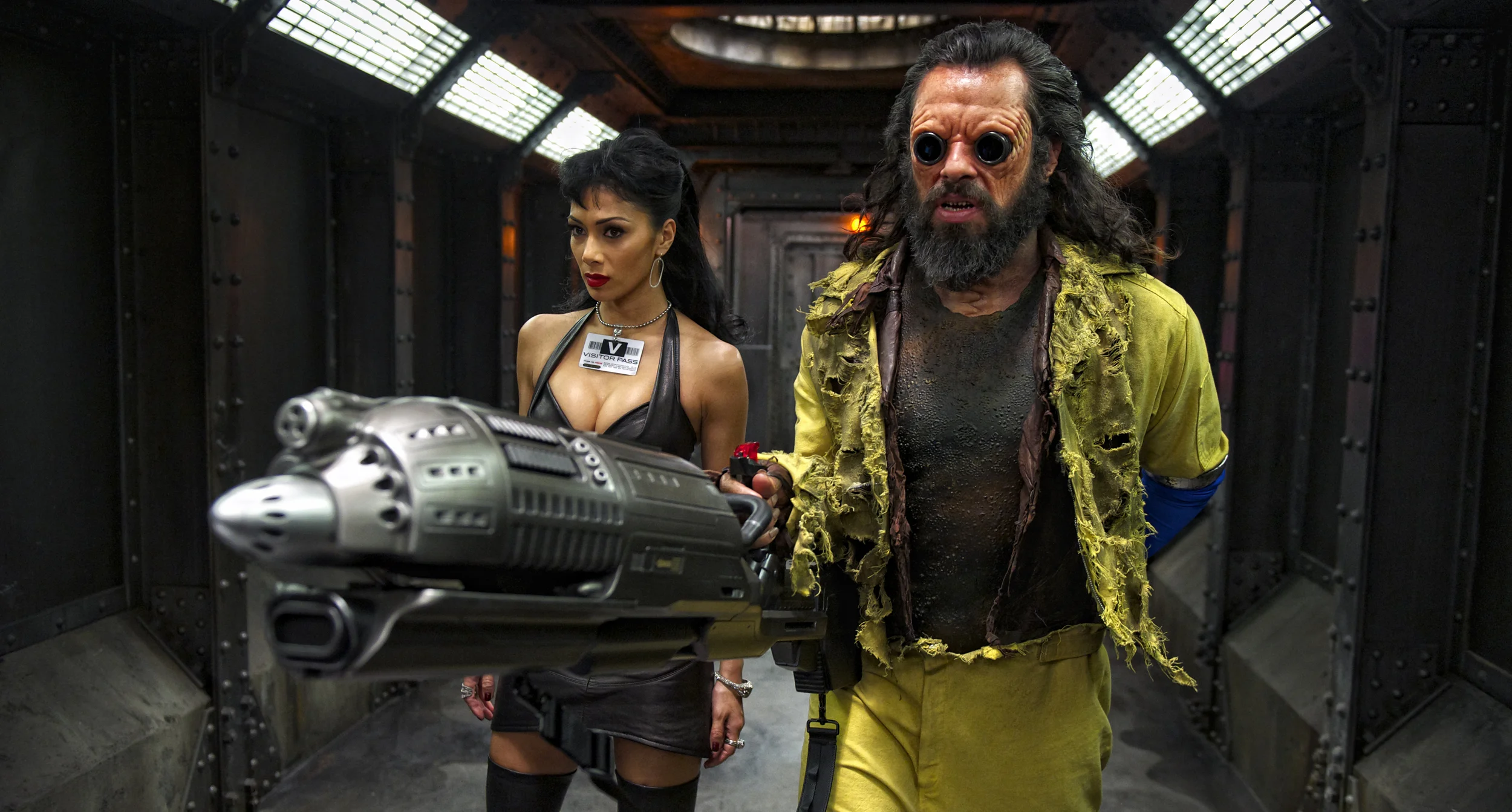 Nicole Scherzinger as Boris’s Girlfriend and Jemaine Clement as Boris (The Animal) in Men in Black 3 (2012)
