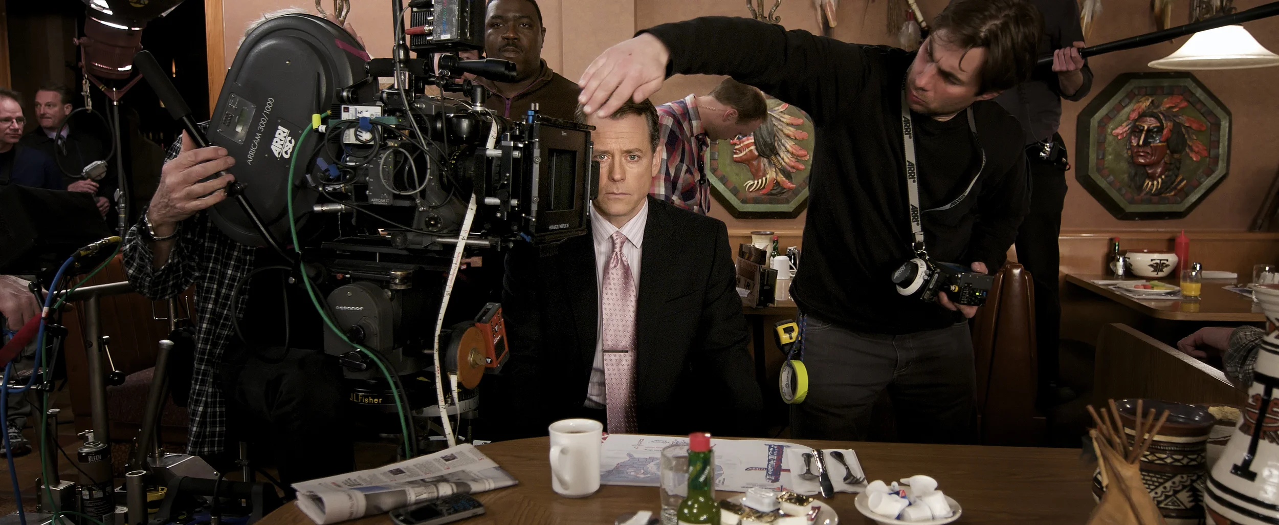 Greg Kinnear focusing between shots on the set of Thin Ice (2011)