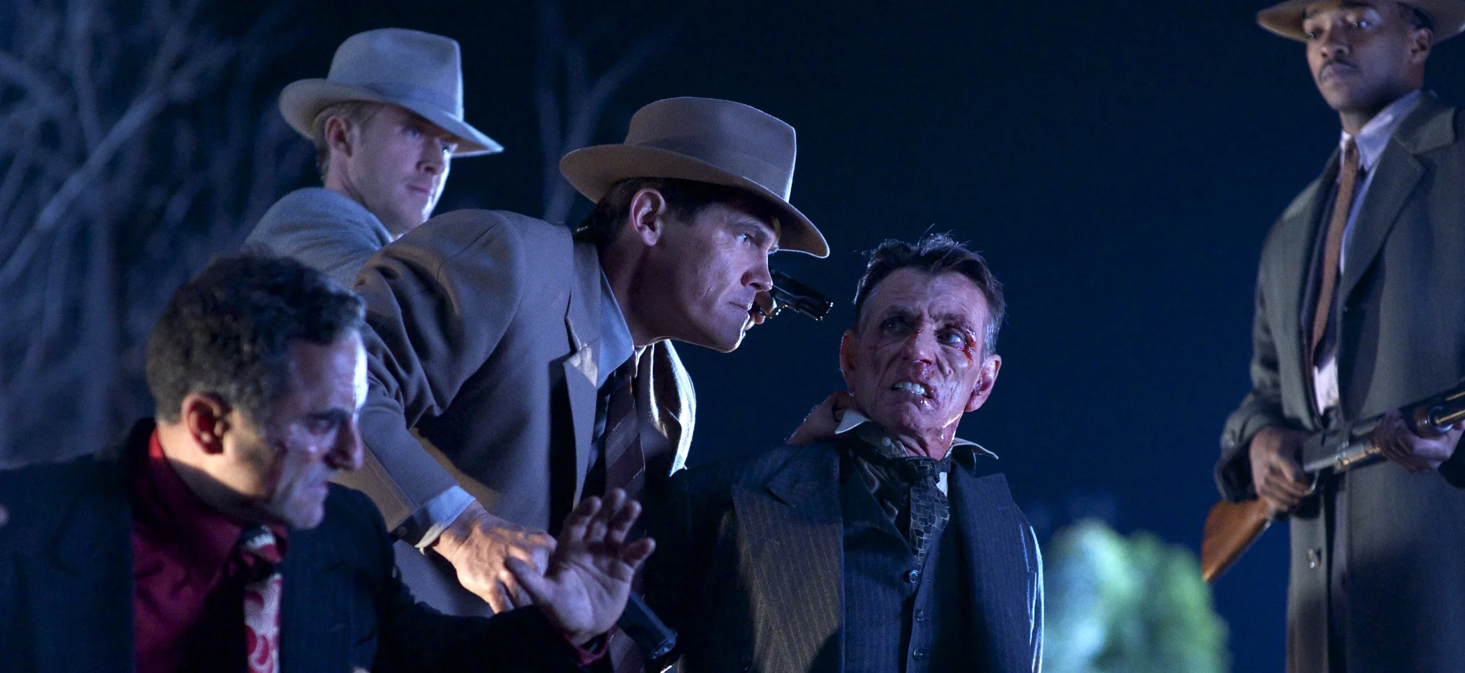 Ryan Gosling as Sgt. Jerry Wooters, Josh Brolin as Sgt. Jerry Wooters, Anthony Mackie as Officer Coleman Harris do some stern talking in Gangster Squad (2013)
