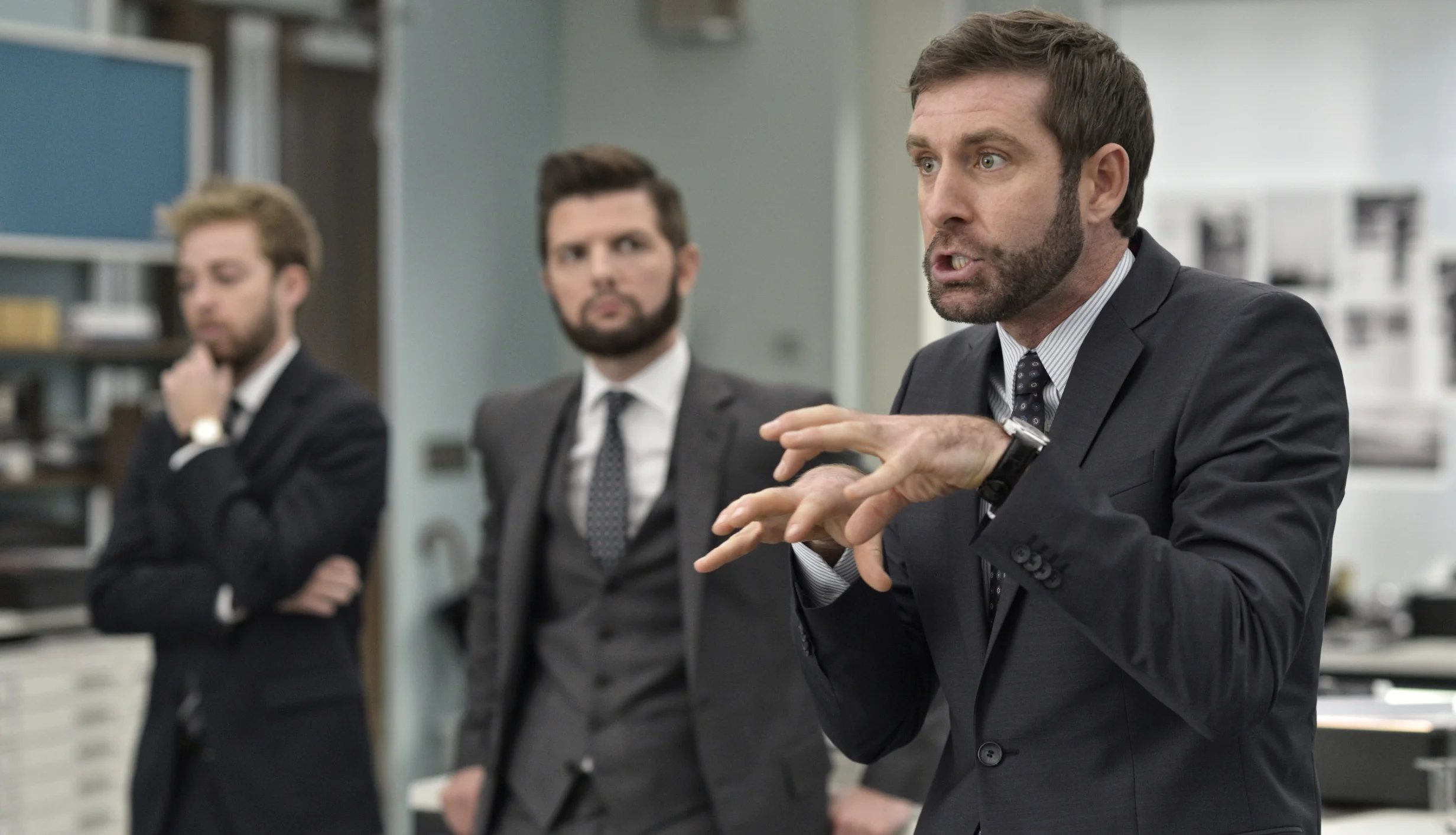 Alex Anfanger, Adam Scott as Ted Hendricks and Paul Fitzgerald as Don Proctor explain things to the staff in The Secret Life of Walter Mitty (2013)