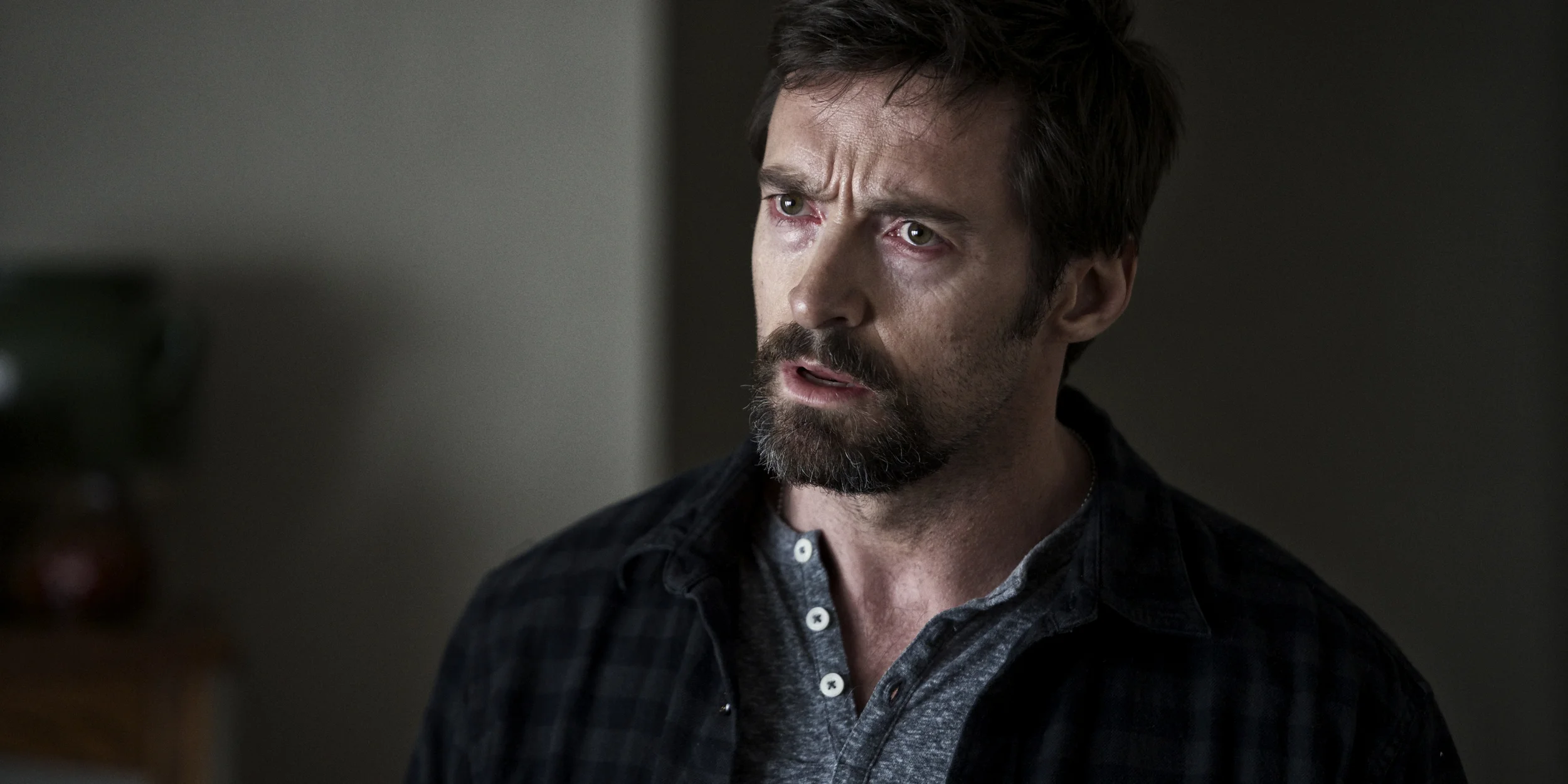 Hugh Jackman as Keller Dover asking questions in Prisoners (2013)