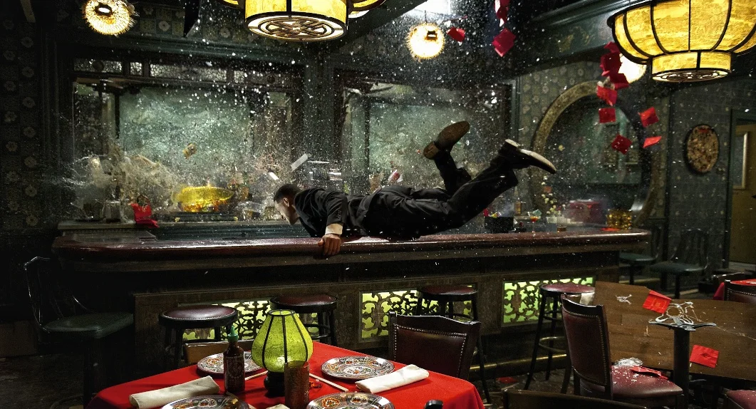 Will Smith as Agent J narrowly avoids being shot in Men in Black 3 (2012)