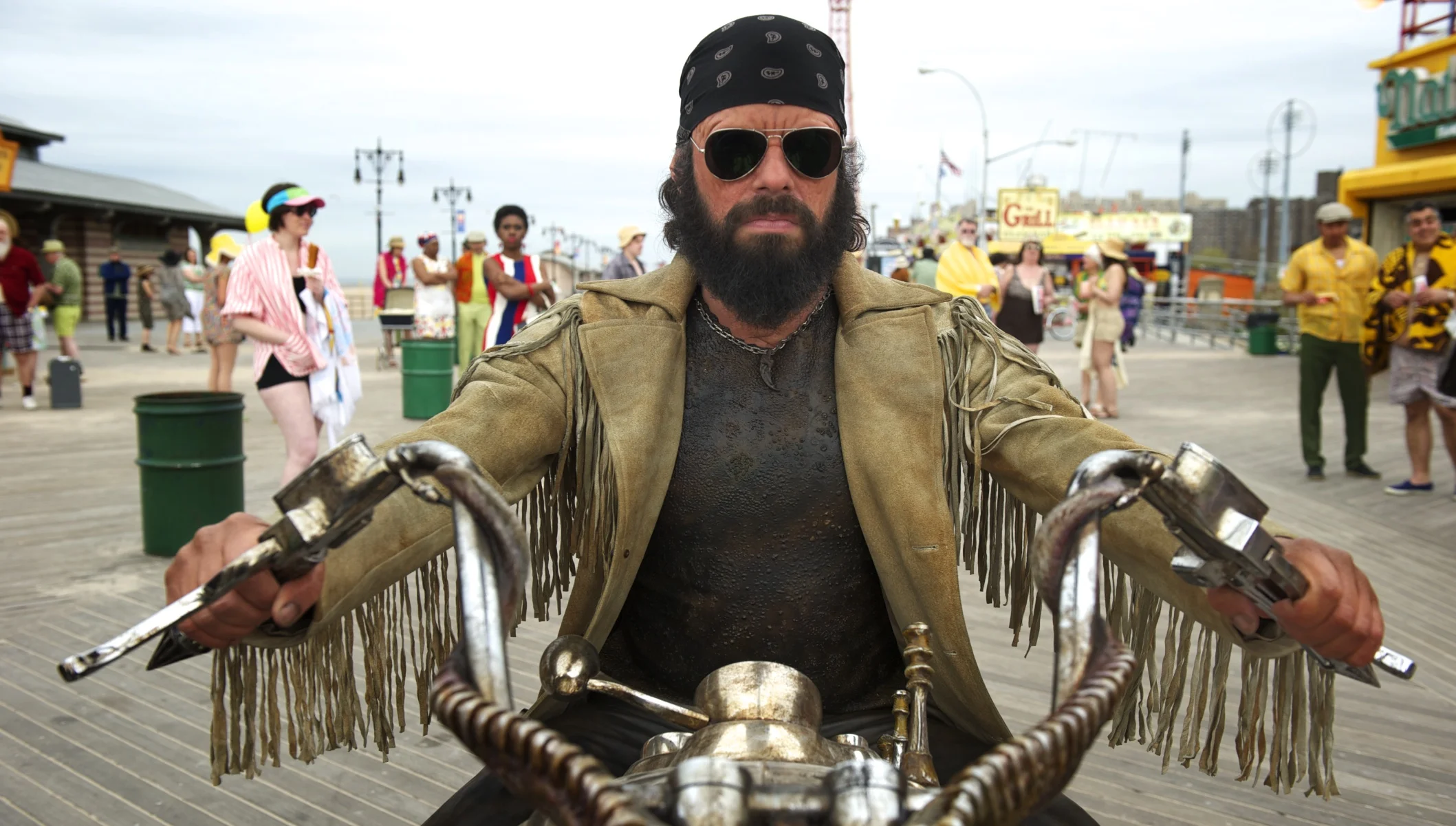 Jemaine Clement as Boris (The Animal) rides down the boardwalk in Men in Black 3 (2012)