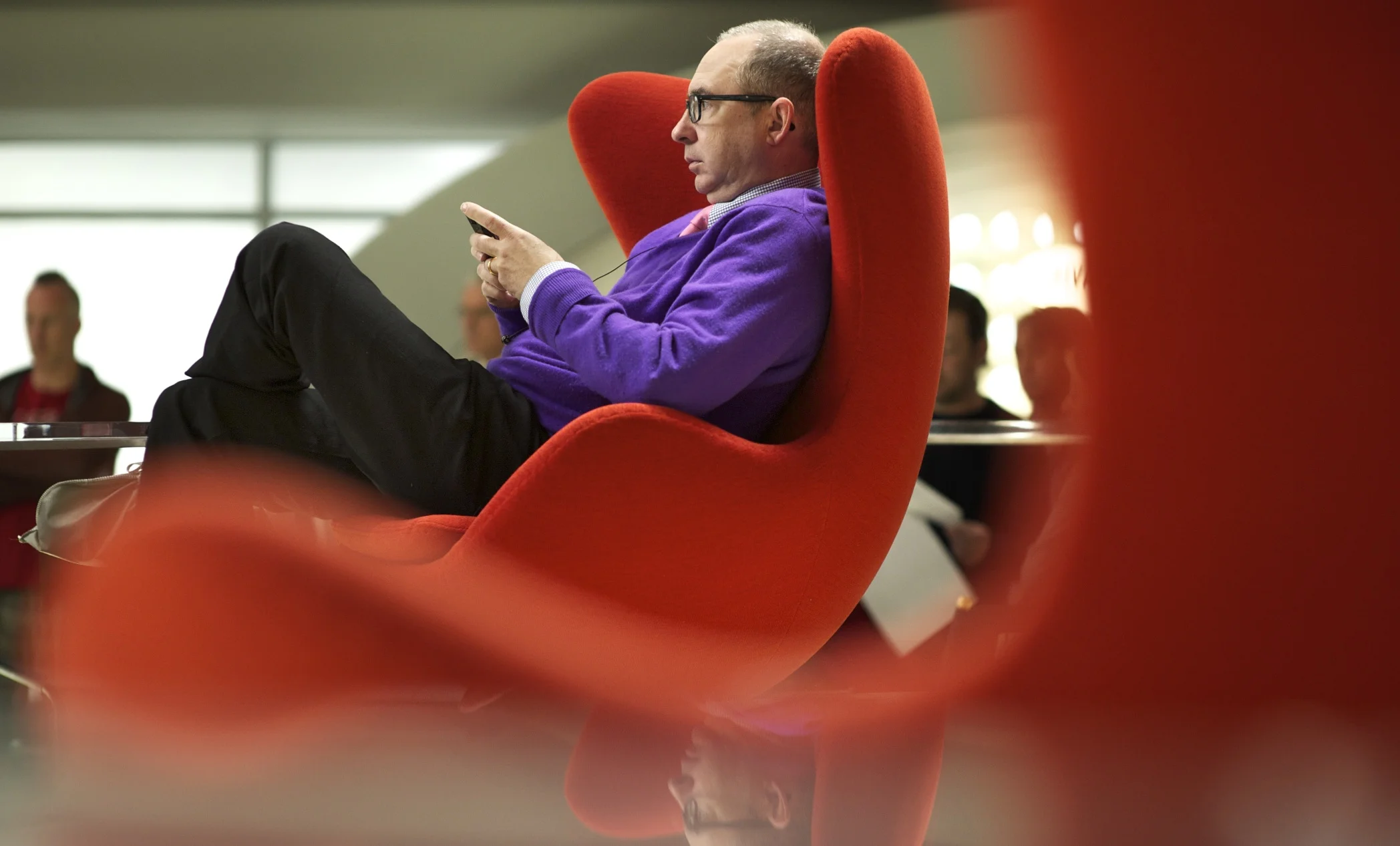 Director Barry Sonnenfeld in red set chair on the set of Men in Black 3 (2012)