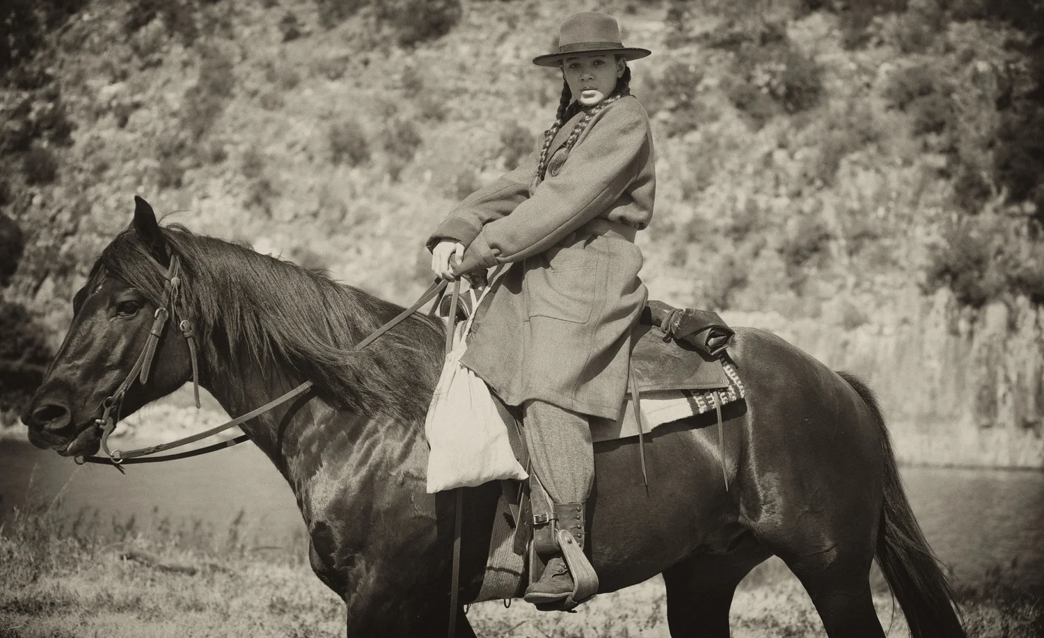 Hailee Steinfeld as Mattie Ross on her horse in True Grit (2010)