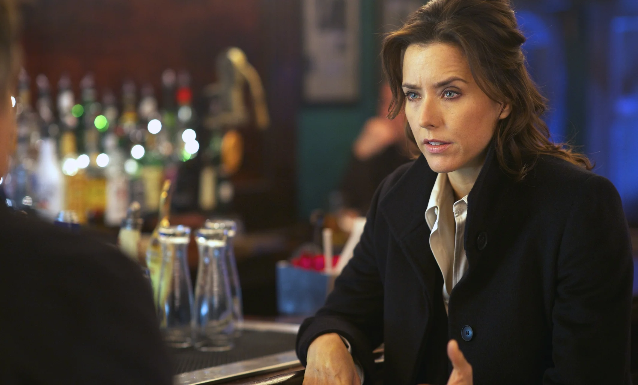 Téa Leoni as Special Agent Claire Denham in the reverse of the bar scene in Tower Heist (2011)