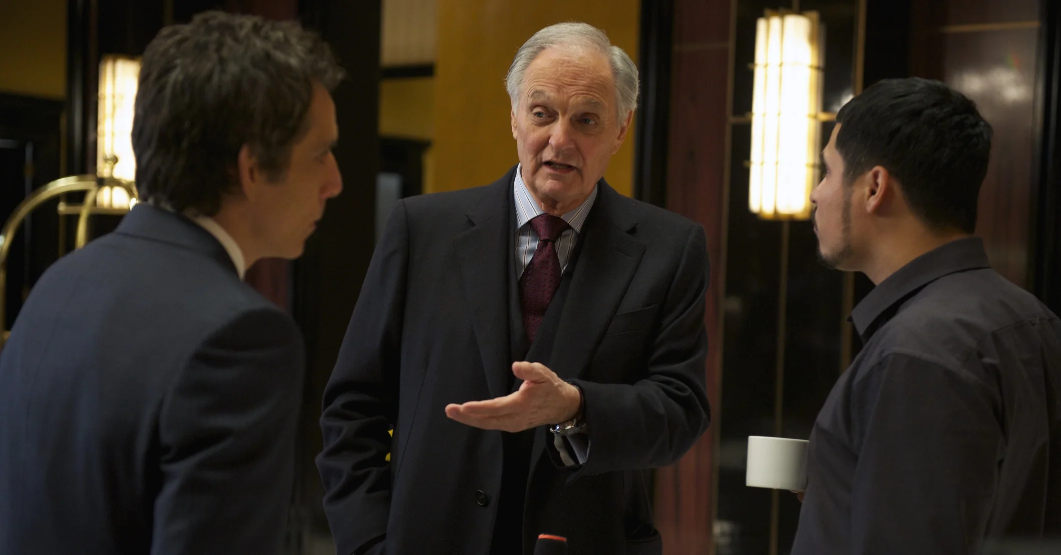 Ben Stiller as Josh Kovacs, Alan Alda as Arthur Shaw, and Michael Peña as Rick Malloy in Tower Heist (2011)