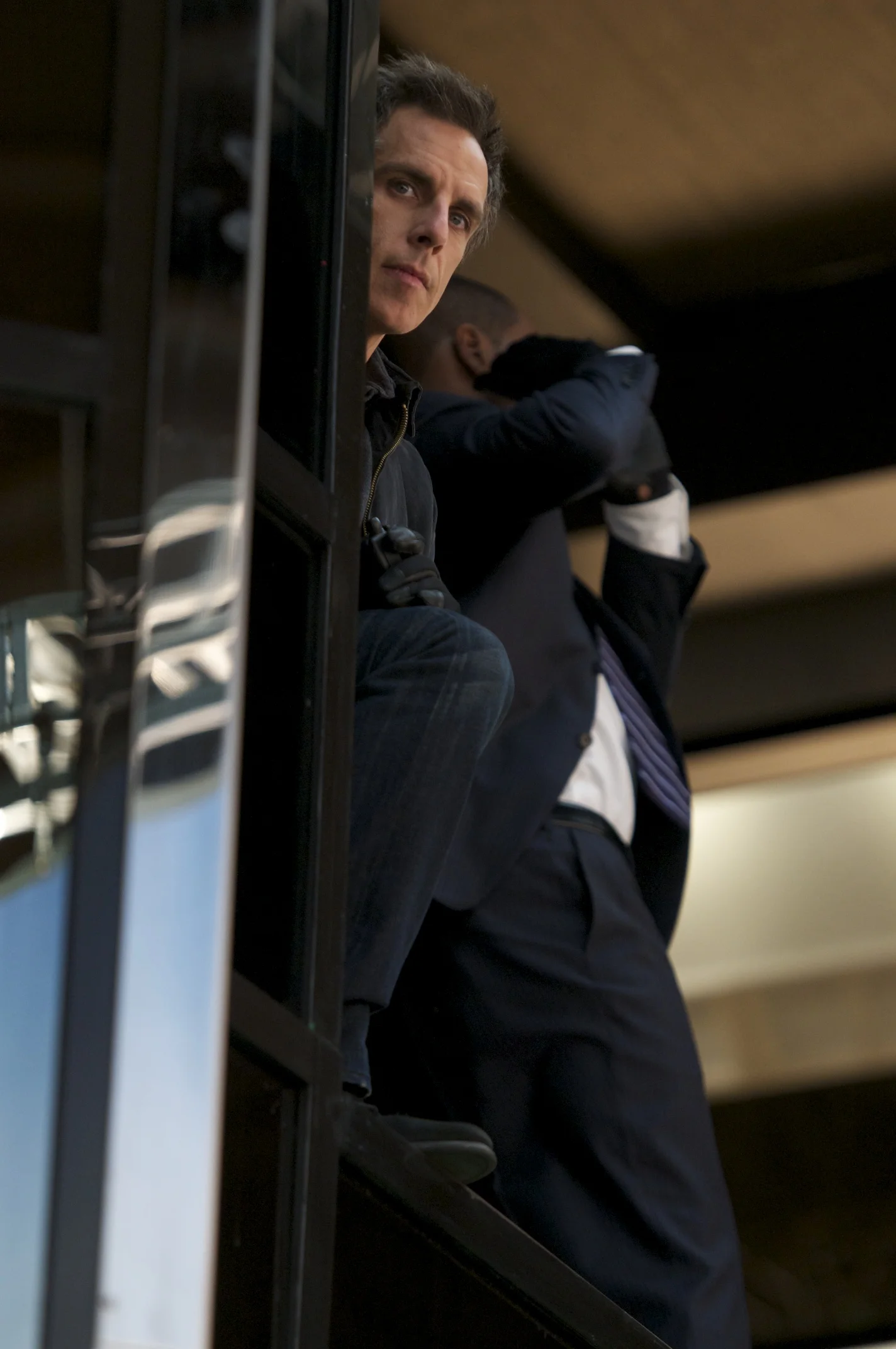 Ben Stiller watches the photographer on the set of Tower Heist (2011)