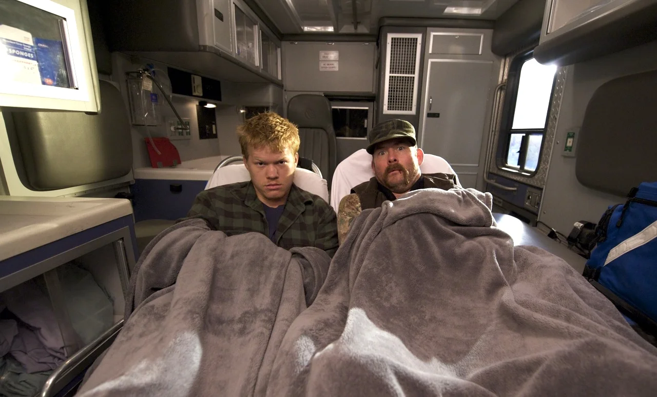 Jesse Plemons as Jake and David Koechner as Gus after their minds have been blown in Paul (2011)