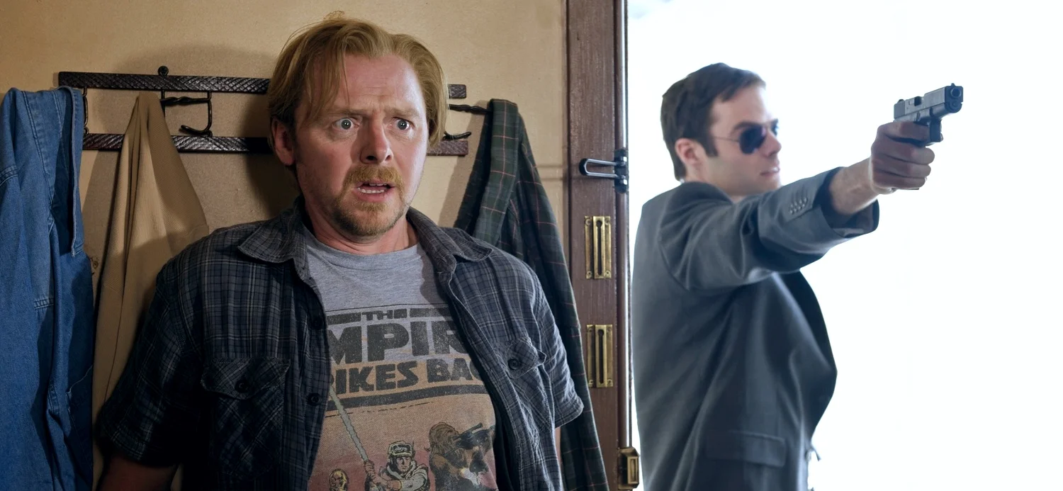 Simon Pegg as Graeme Willy and Bill Hader as Haggard playing hide and seek in Paul (2011)