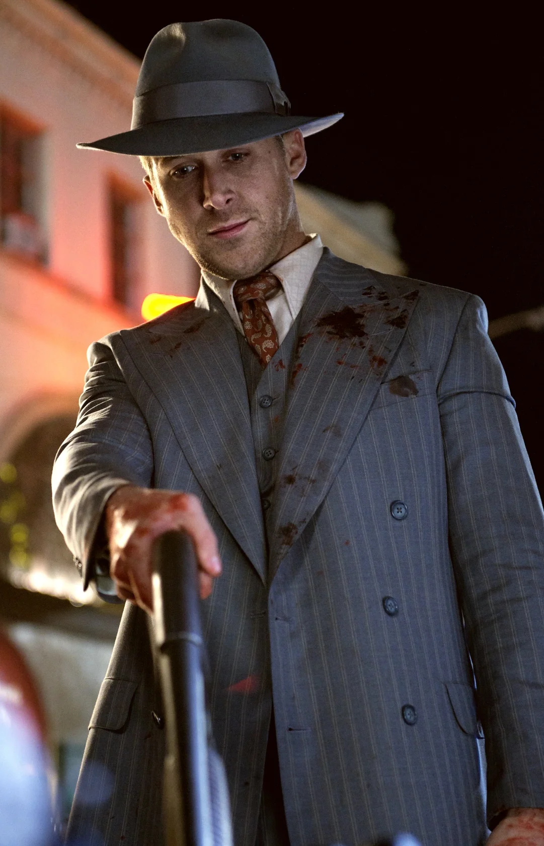 Ryan Gosling as Sgt. Jerry Wooters takes matters into his own hands in Gangster Squad (2013)