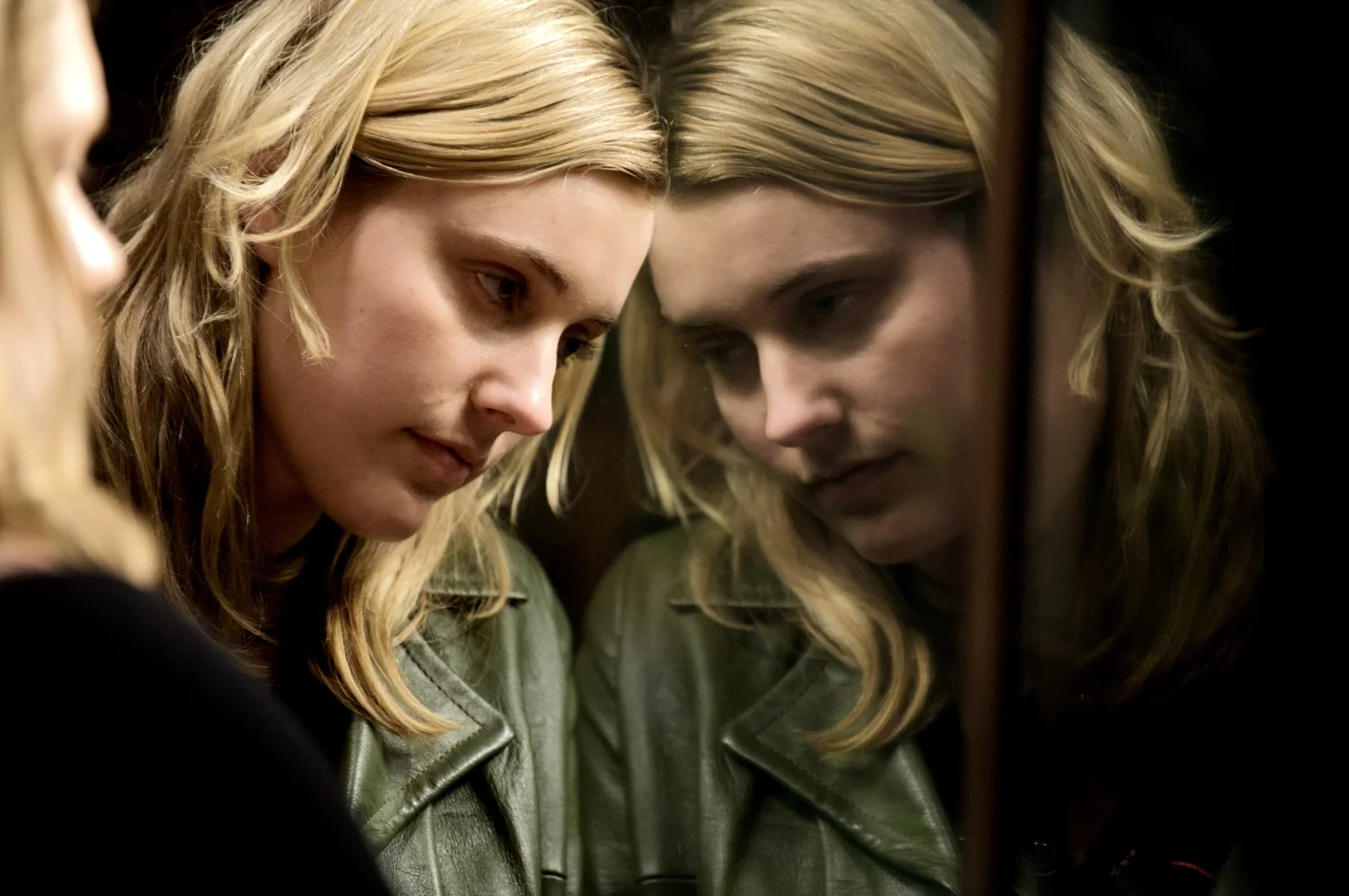 reta Gerwig as Florence Marr in reflection in Greenberg (2010)