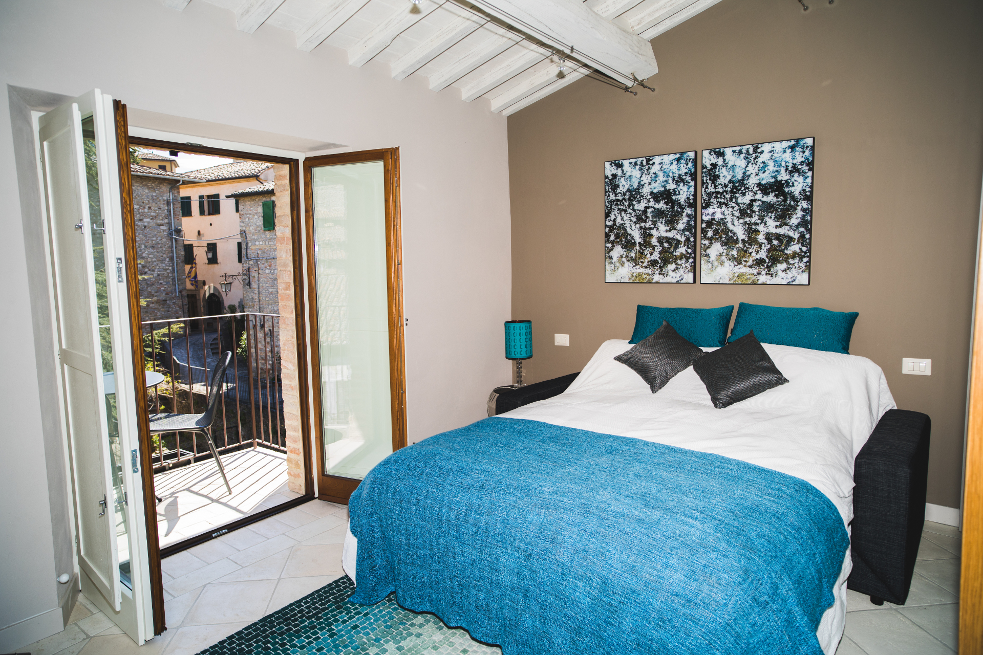 the-apartments-montone-bedroom-two-and-balcony-HD.jpg