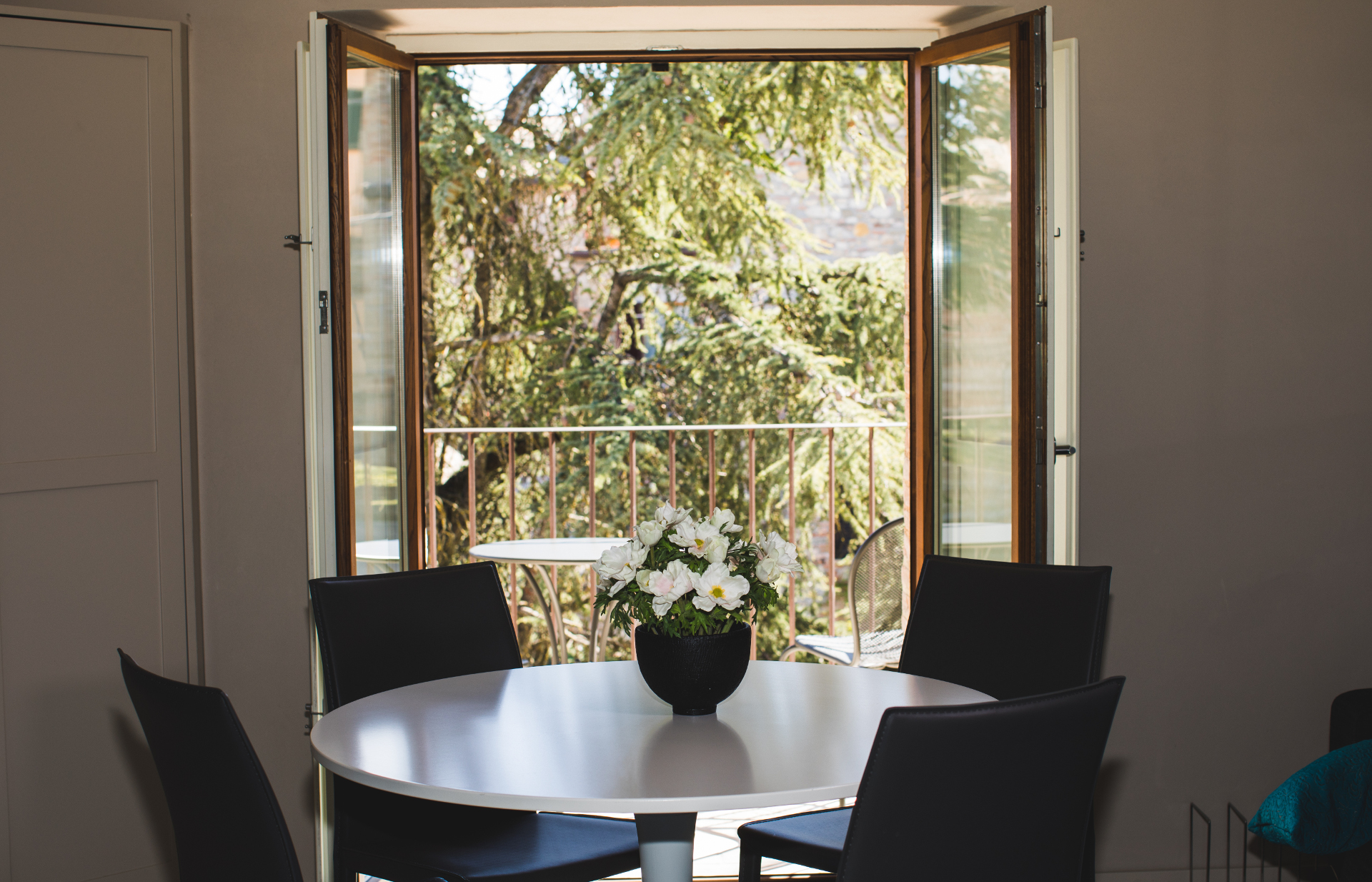 the-apartments-montone-dining-table-and-balcony-HD.jpg