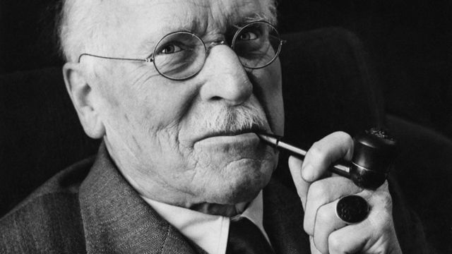 Carl Jung smoking a pipe. 