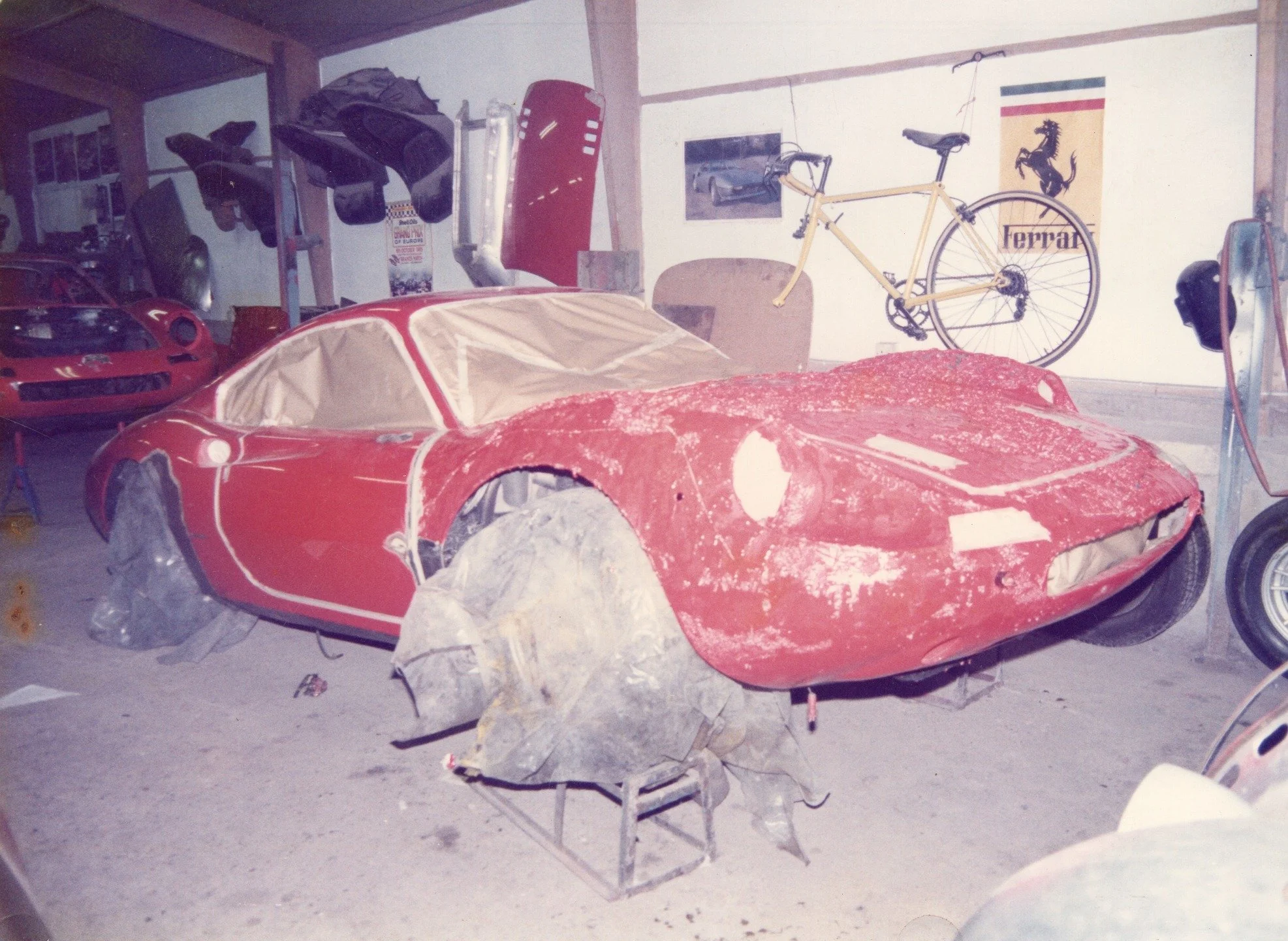 Prestige Archives continue for January.

Ferrari Dino being paint stripped ready for bodywork back in the 1990's. Some more Dino's in the background. We still use these old moulds now to create new bodywork like front ends and door skins - supplied a