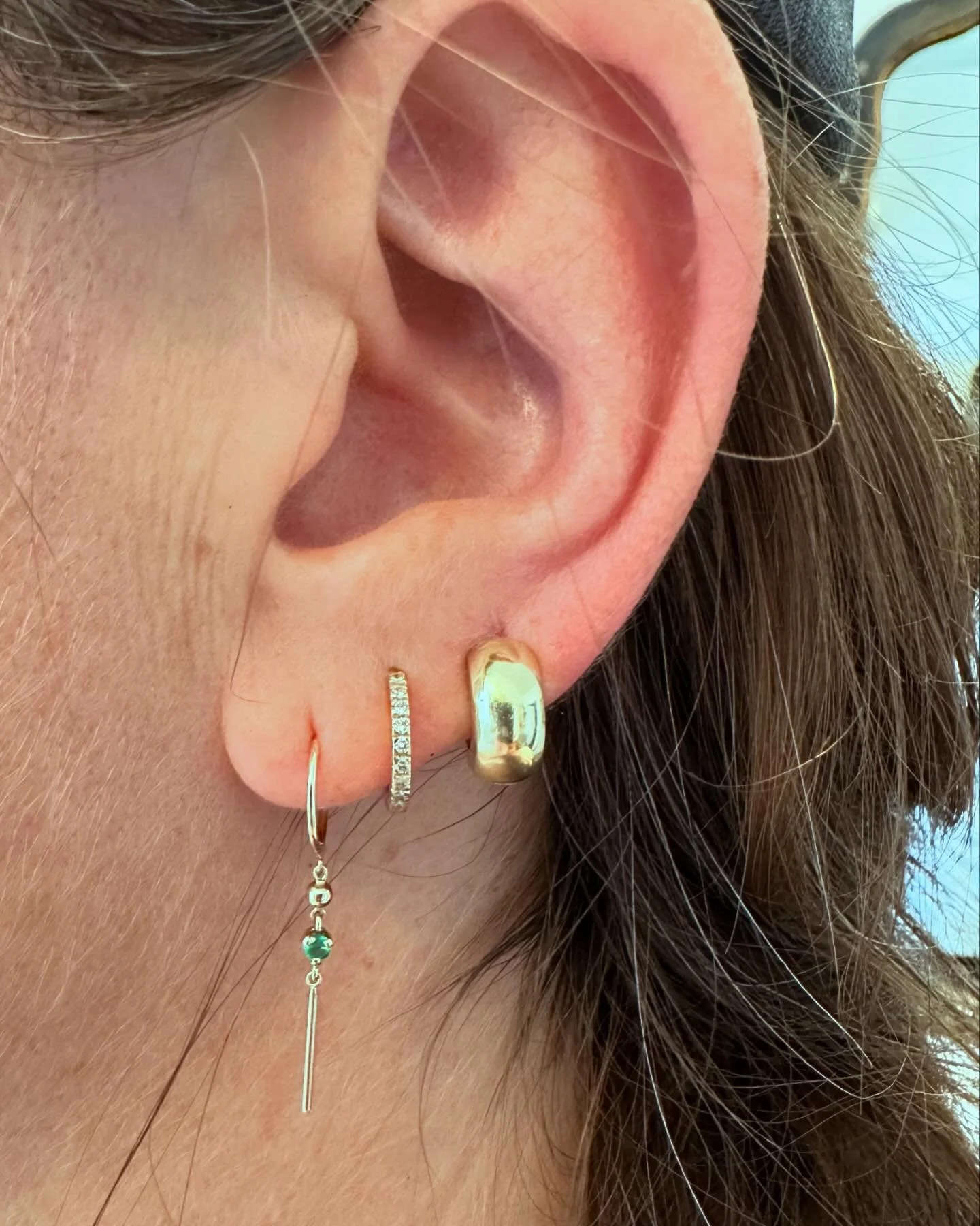 Diamond Huggie (with emerald), Pav&eacute; Snuggie (8mm), Lil bob.  All in 14k yellow gold.