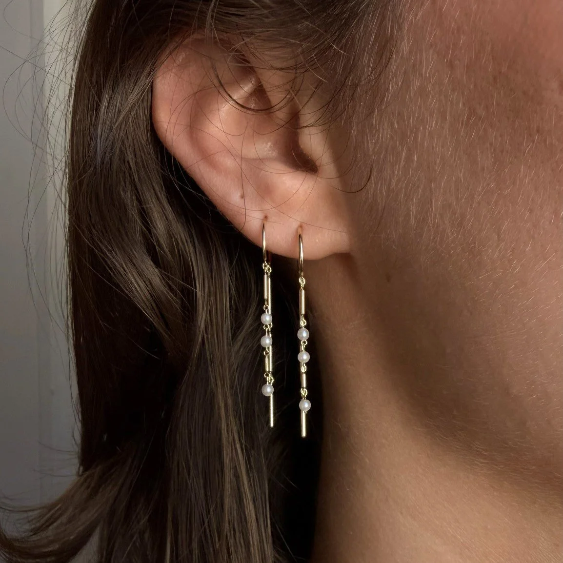 Mismatched Pearl 2s on Michaela.jpg