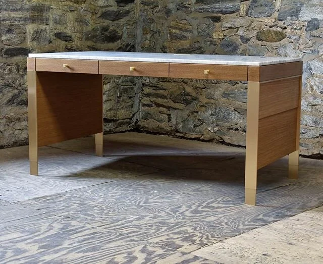 One of two custom desks based on my Castaic sideboard in fumed white oak with brass hardware and a Carrara marble top. With integrated cord management, a hybrid metal/wood structural system, and high level finishes throughout, these were easily the m