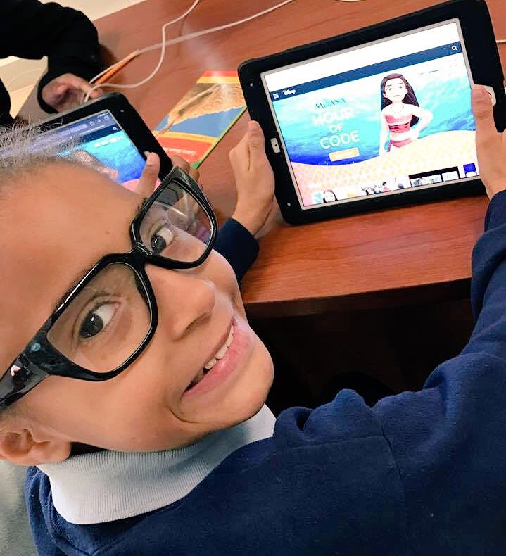 A student at IPS School #51 is excited to start the Moana Hour of Code activity.