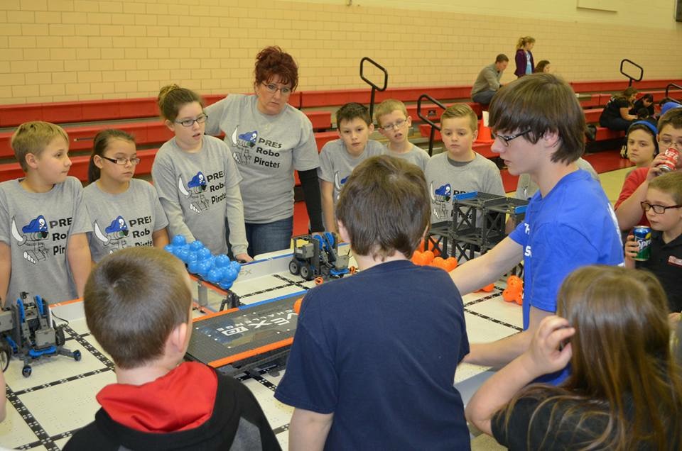The Robot Pirates of Parkwood Elementary School gather around the field before a match.