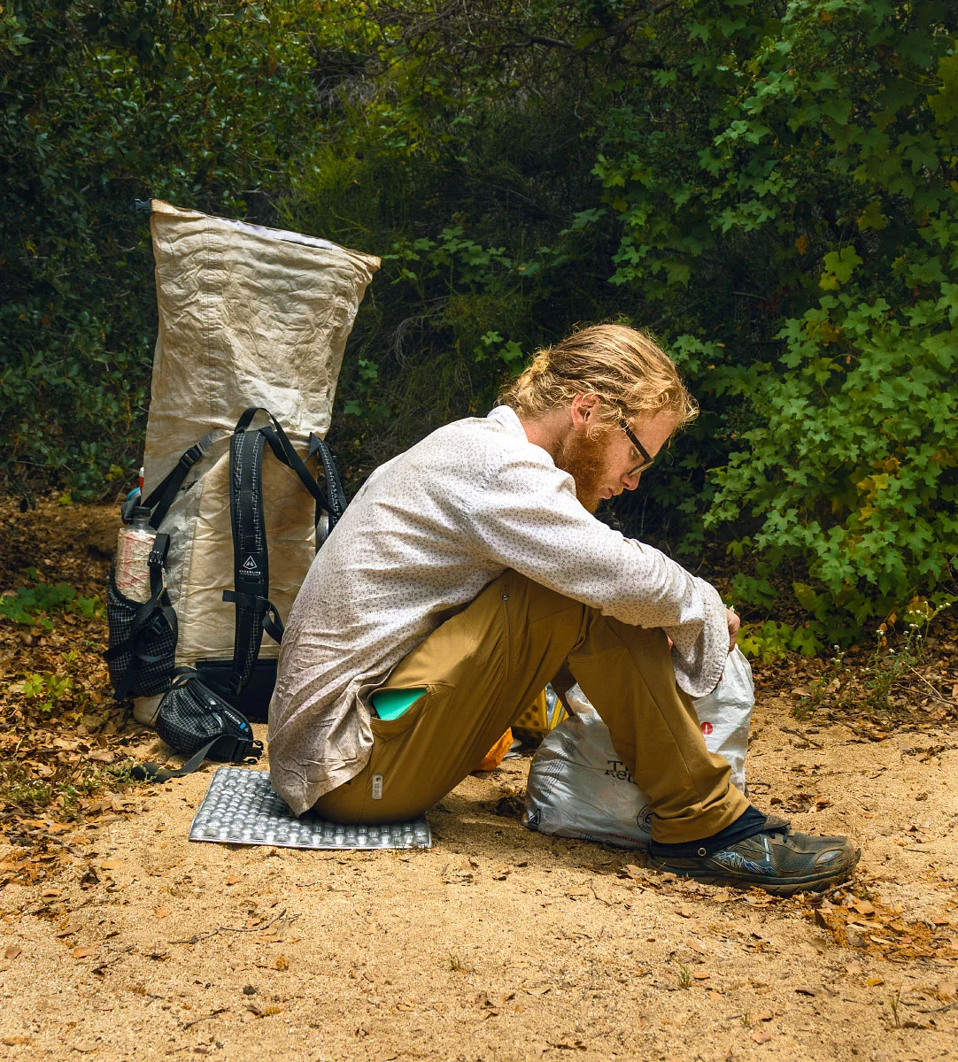Adam takes a snack break.