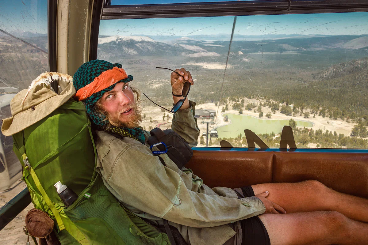 “Trash Bath” rides the Mammoth Ski Resort gondola.