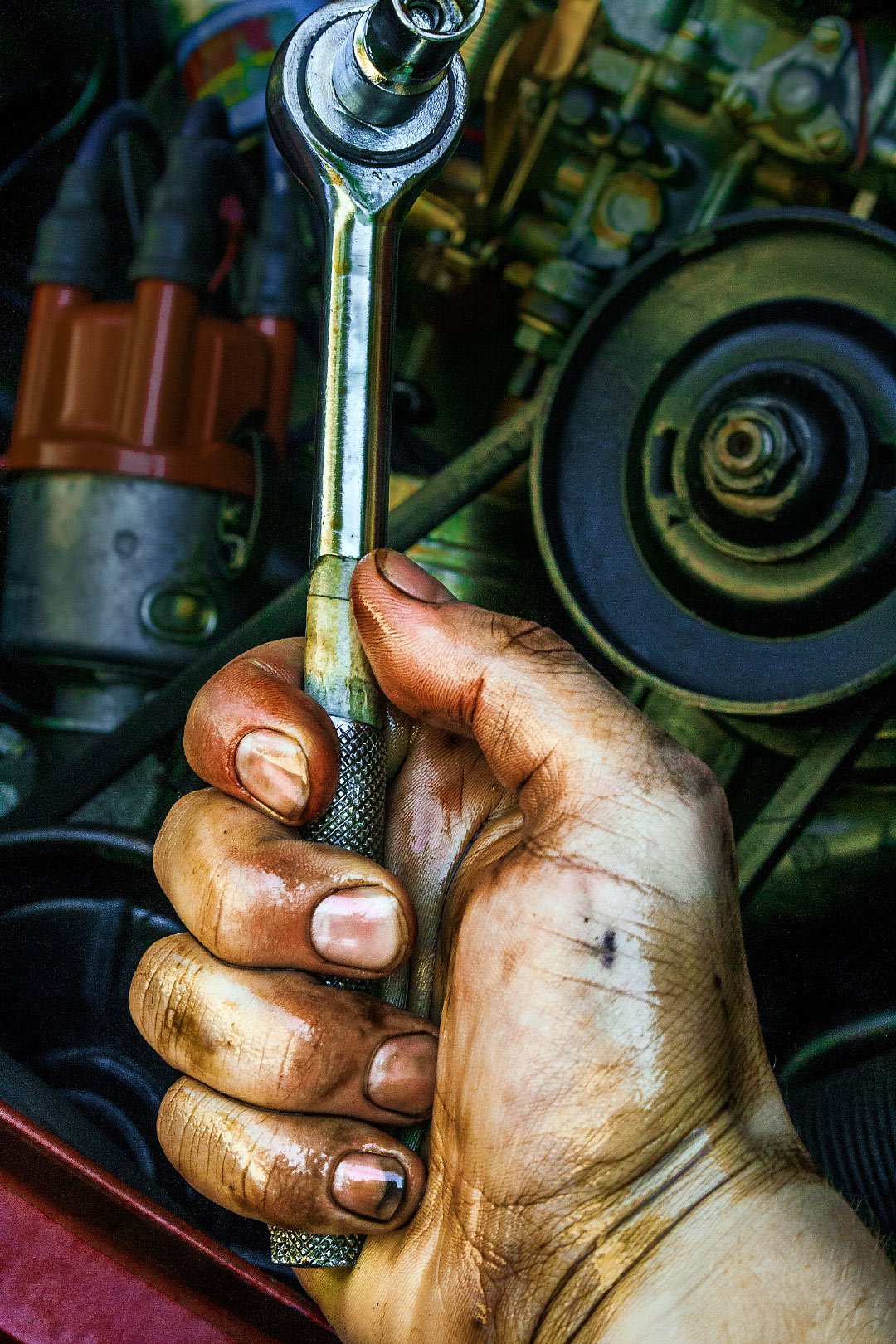 oil-change-socket-wrench-hand.jpg